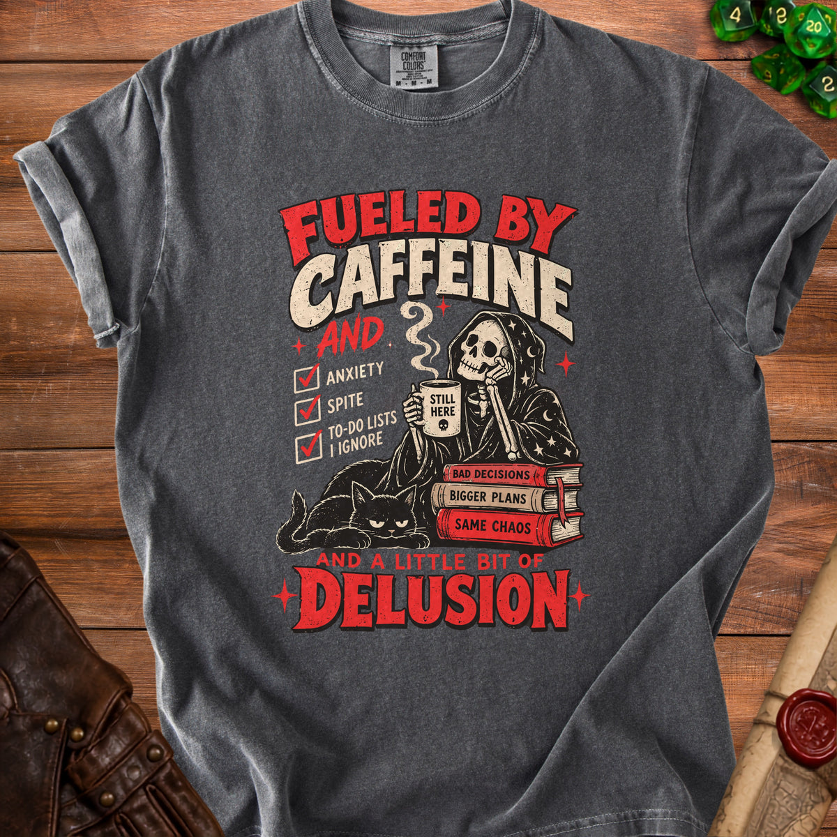 Grim reaper with coffee and cat on t-shirt that says "Fueled by Caffeine and Delusion."