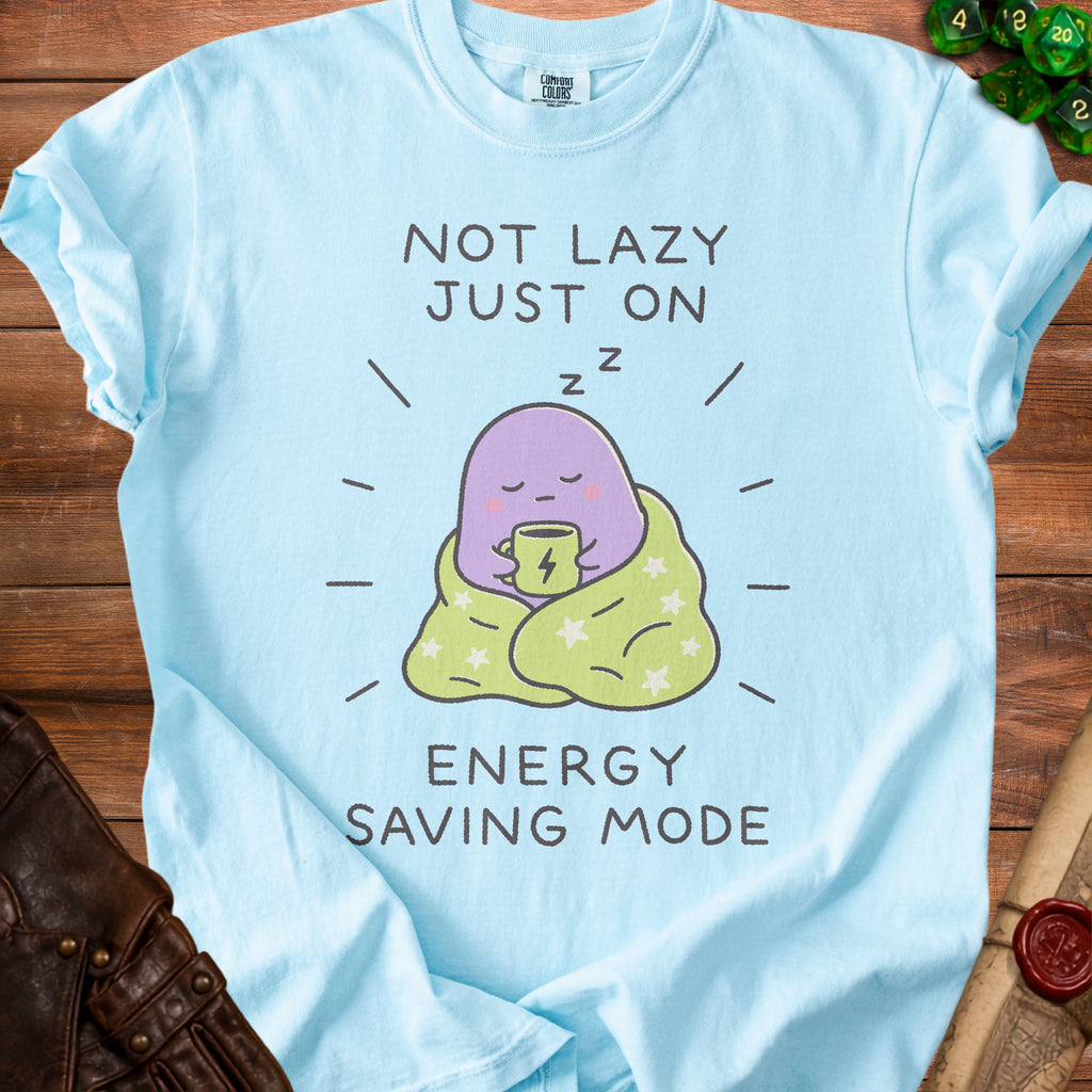 Light blue t-shirt with text "NOT LAZY JUST ON ENERGY SAVING MODE" and a cartoon character.