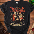 Black t-shirt with "How to Unleash the Old Ones" and summoning primer text.