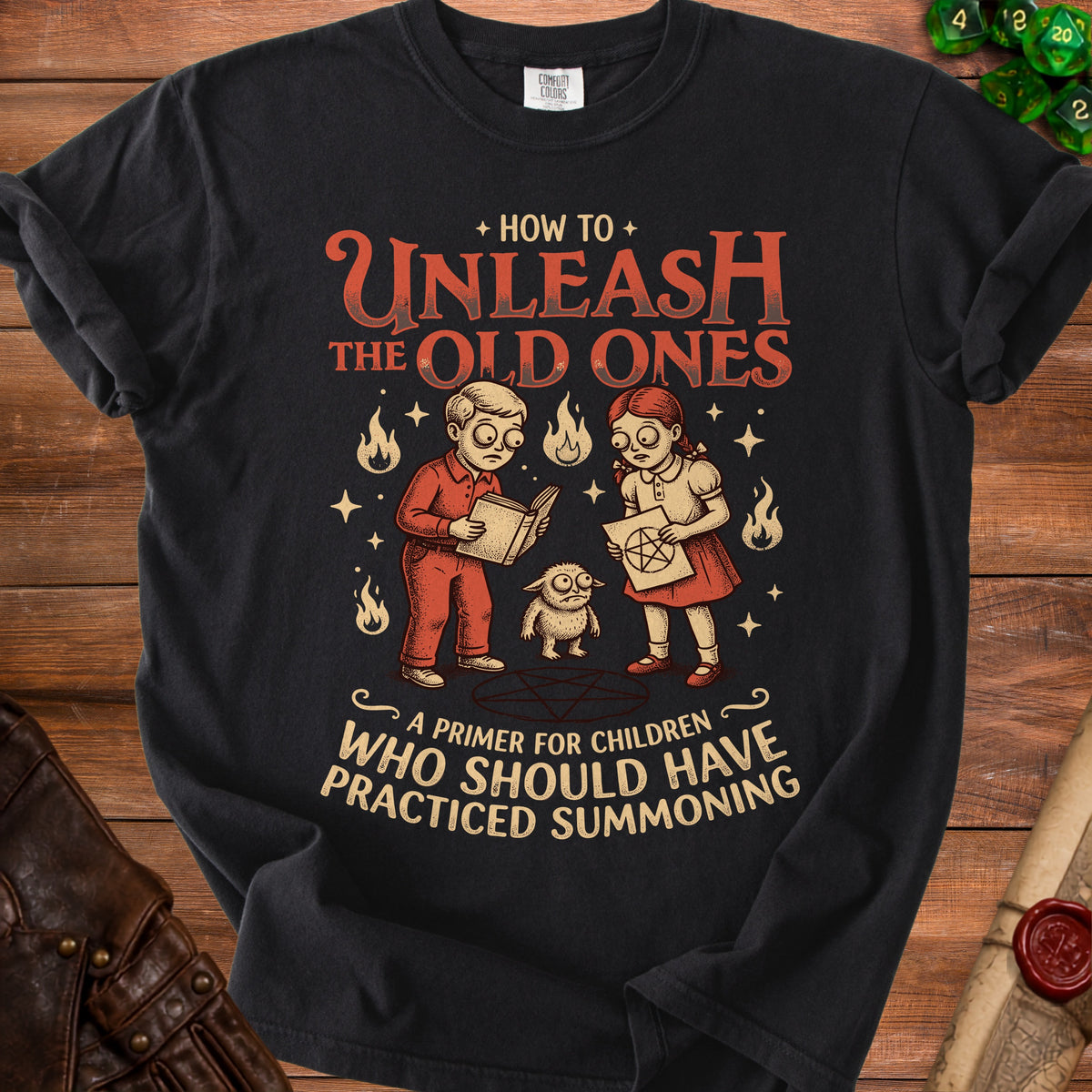 Black t-shirt with "How to Unleash the Old Ones" and summoning primer text.