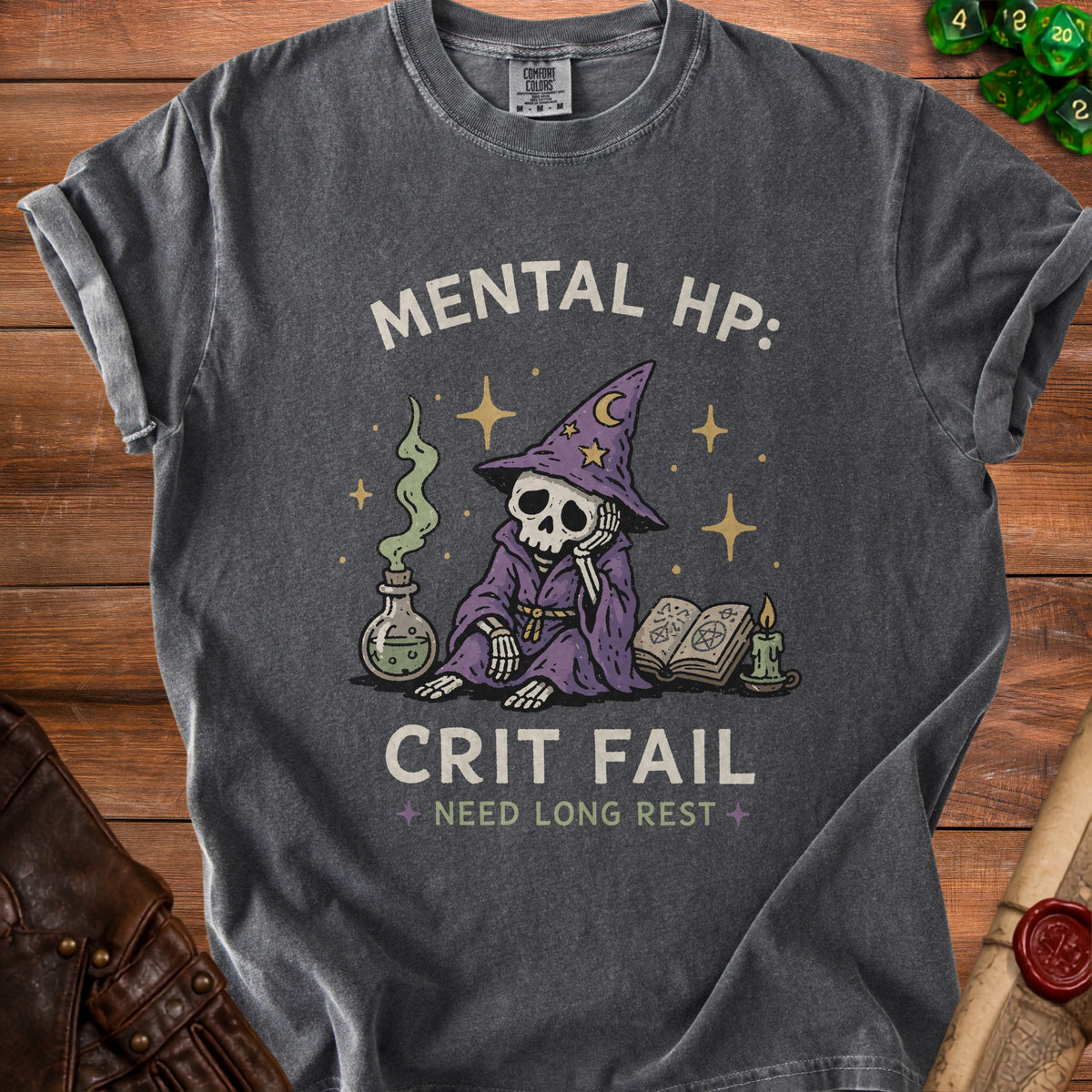 Dark gray t-shirt with a graphic of a skeleton wizard, potion, and spellbook.