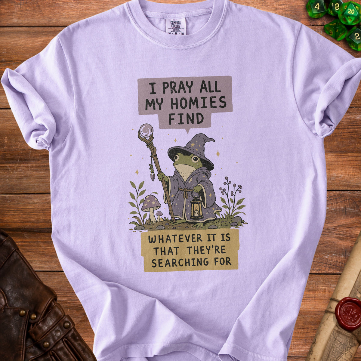 Lavender t-shirt with wizard frog graphic and text.