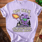 Purple t-shirt with cartoon wizard casting fireball and text "BIG TALK FOR SOMEONE IN FIREBALL RANGE".