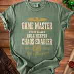 Green t-shirt with "Game Master, Storyteller, Rule Keeper, Chaos Enabler, Roll Responsibly" text.