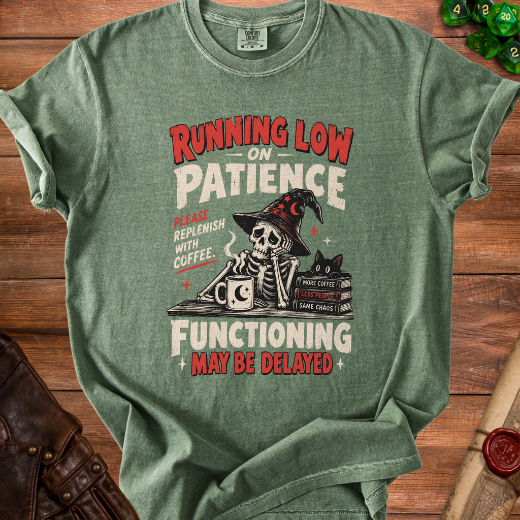 Green t-shirt with skeleton, hat, coffee mug, and text "Running Low on Patience".