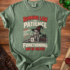 Green t-shirt with skeleton, hat, coffee mug, and text "Running Low on Patience".