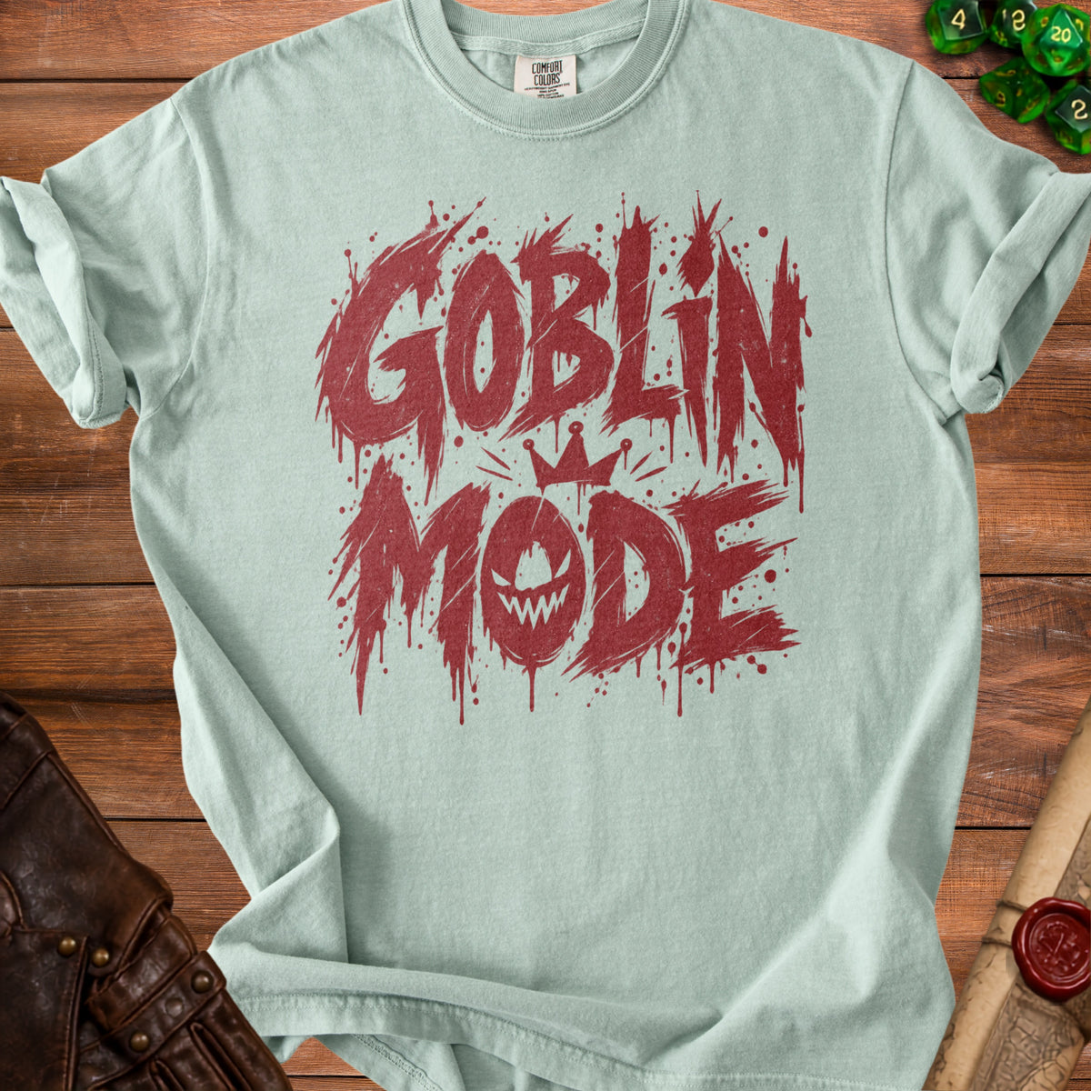 Light green t-shirt with red "Goblin Mode" graphic and crown illustration.