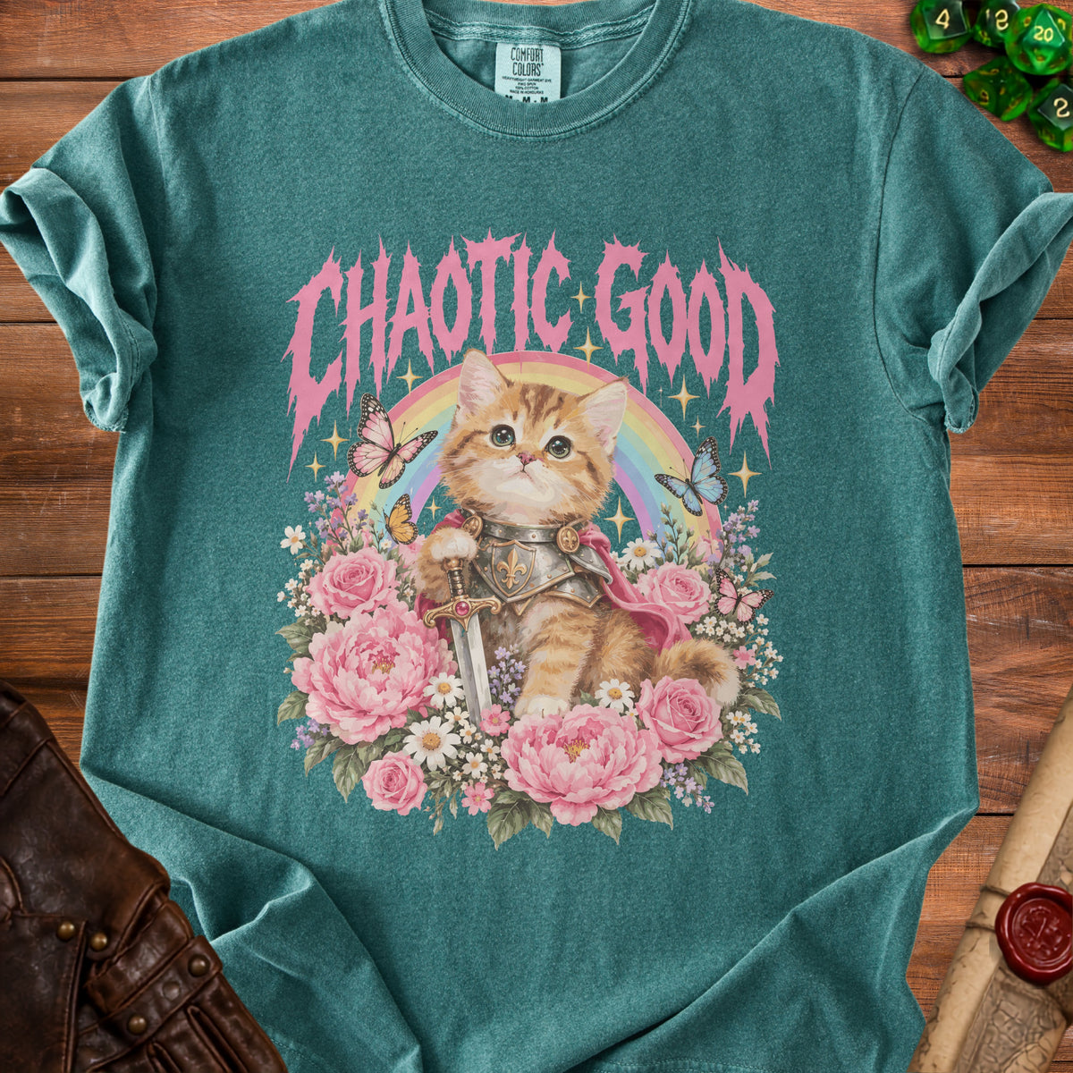 T-shirt featuring a knight kitten, pink flowers, butterflies, and "CHAOTIC GOOD" text.