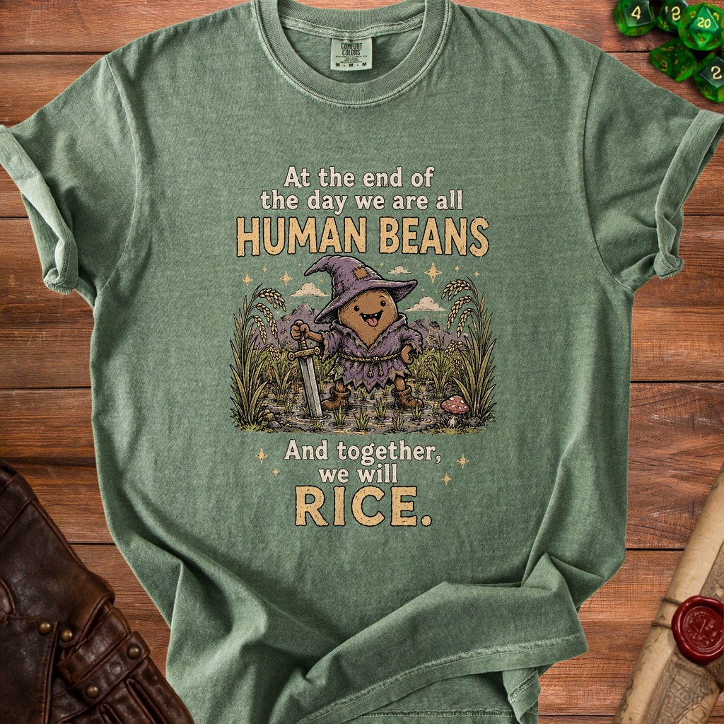 Green t-shirt with a drawing of a bean character and the text "At the end of the day we are all HUMAN BEANS And together, we will RICE."