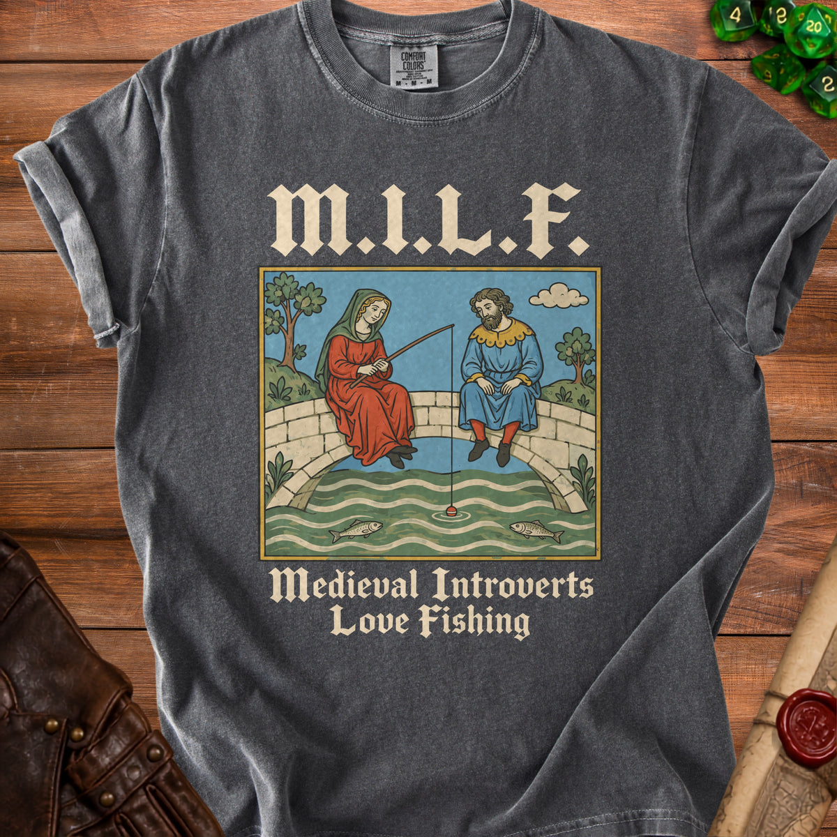 Dark gray t-shirt with medieval art of people fishing and text "M.I.L.F. Medieval Introverts Love Fishing".