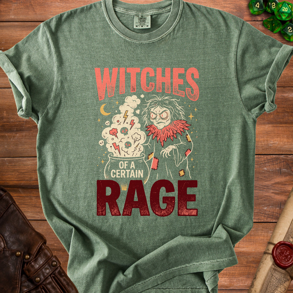 Green t-shirt with "Witches of a Certain Rage" text and witch graphic.