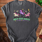 Dark gray t-shirt with three cartoon horses and the text "HOLD YOUR HORSES".