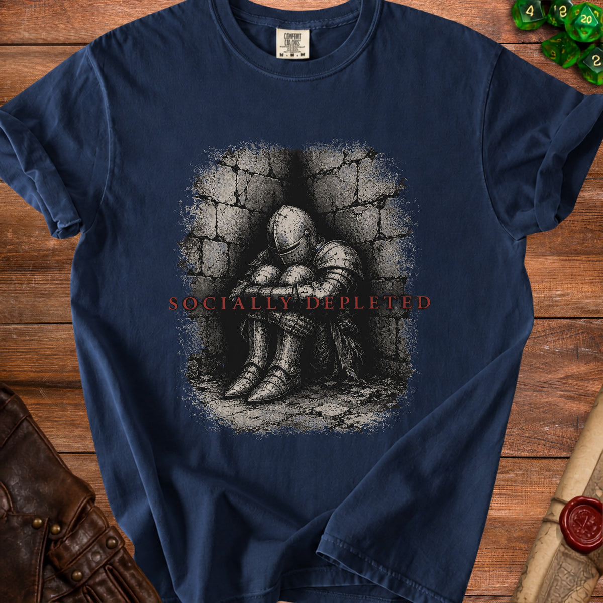 Navy t-shirt with knight in armor, text "SOCIALLY DEPLETED" on stone background.