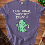 Purple t-shirt with "Emotional Support Demon" text and a green demon graphic.