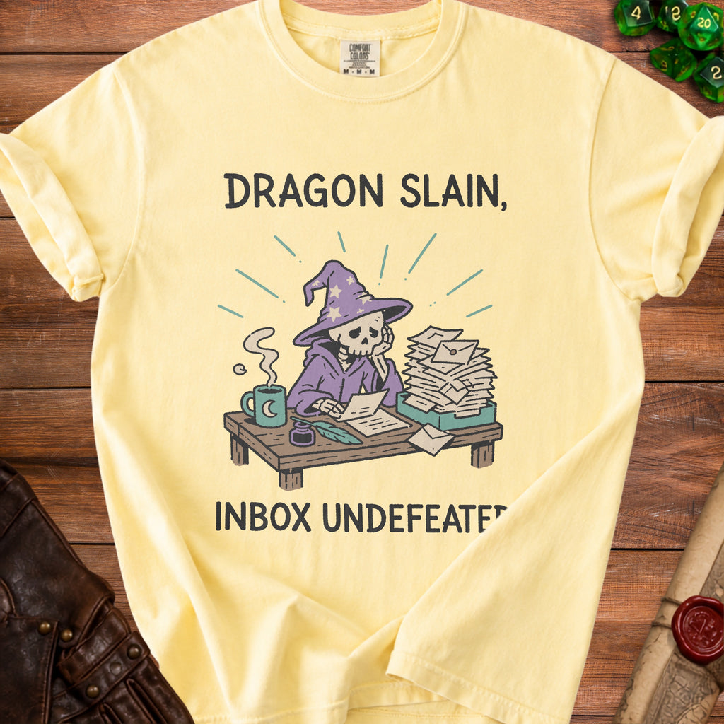 Yellow t-shirt with skeleton wizard and text "Dragon Slain, Inbox Undefeated".
