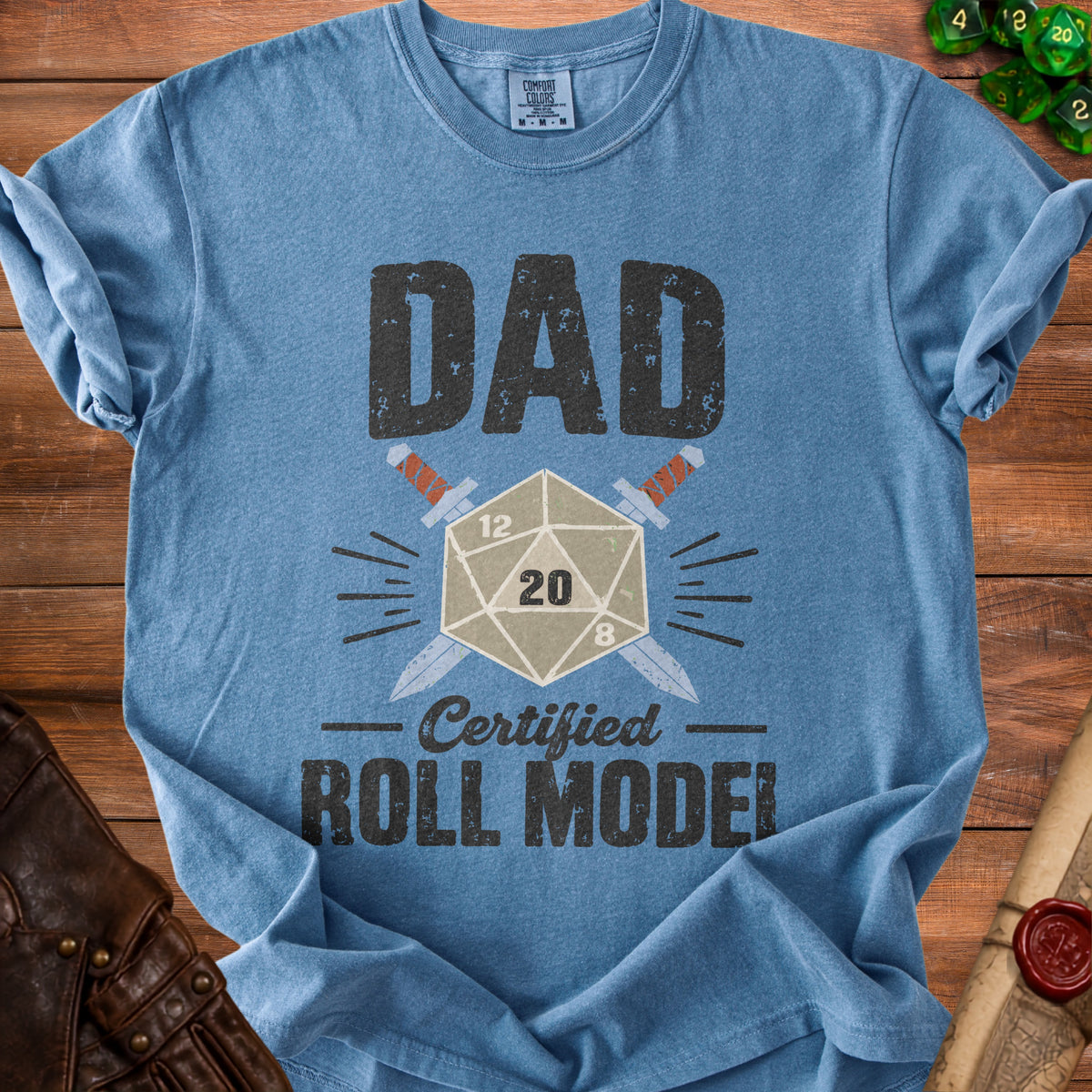 Blue t-shirt with "DAD Certified ROLL MODEL" text and dice imagery.