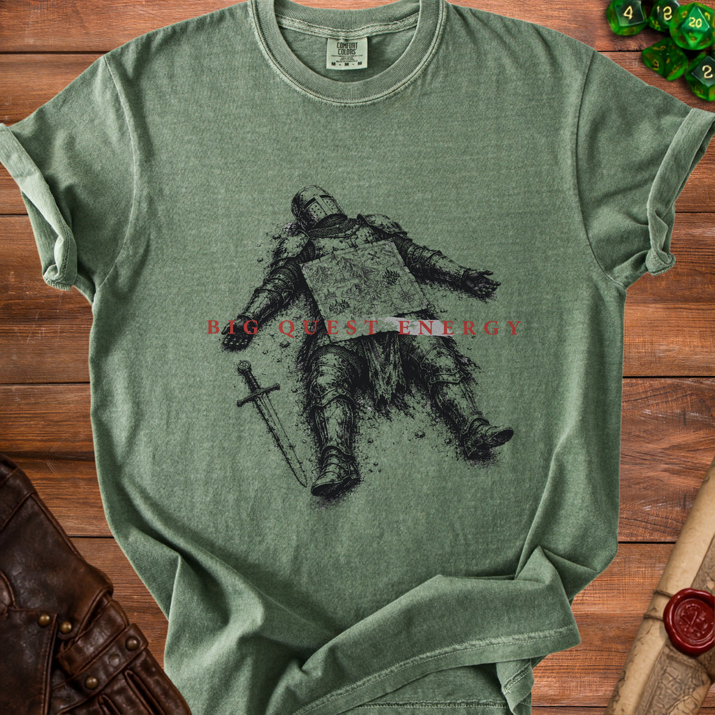 Green t-shirt with illustration of fallen knight, sword, and text "BIG QUEST ENERGY".