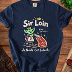 Navy t-shirt with cartoon goblin holding sword next to steak, text "Sir Loin" and "A Noble Cut Indeed".
