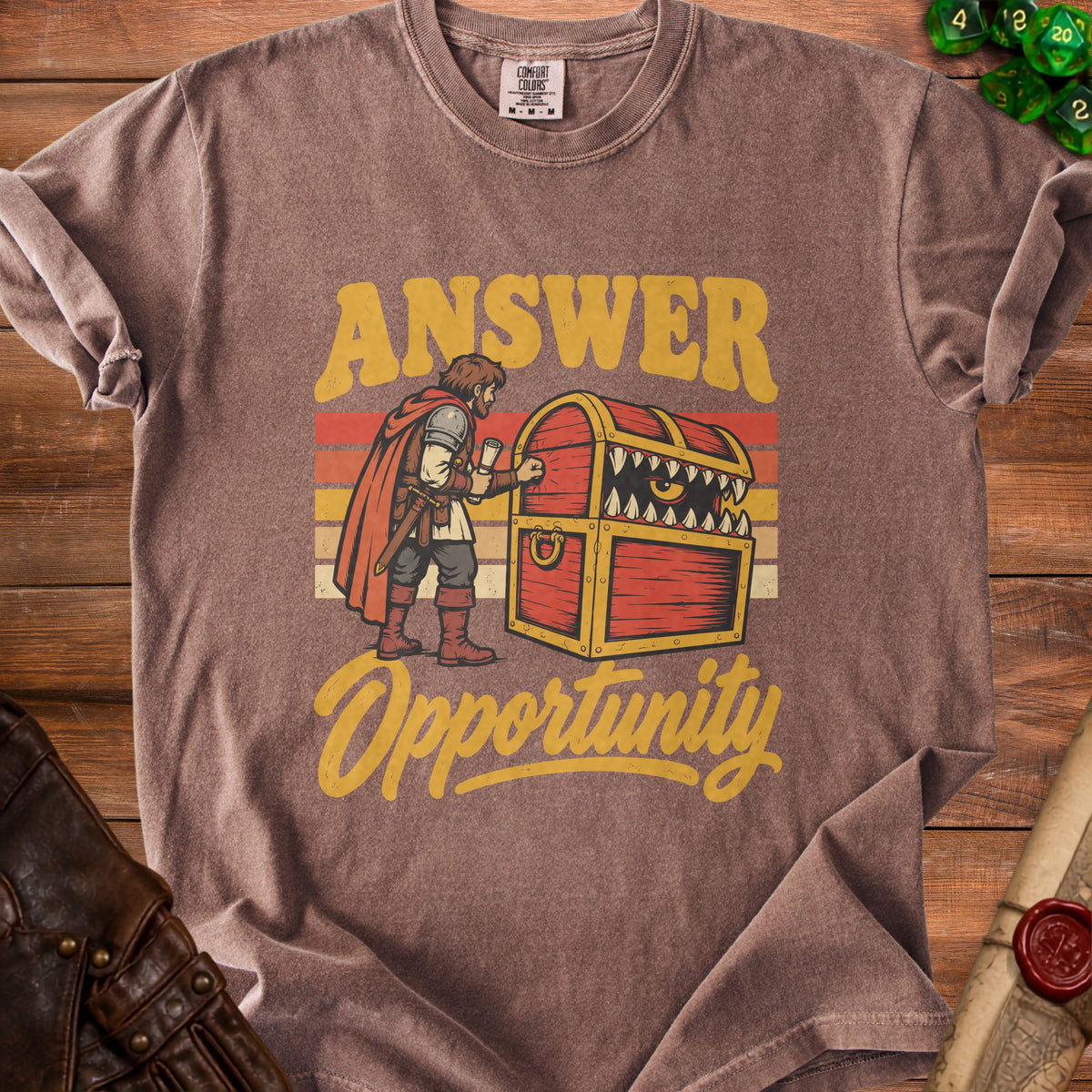 T-shirt graphic with text "ANSWER" and a monster treasure chest, "Opportunity".