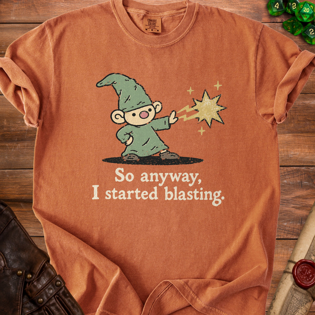 Orange t-shirt with cartoon gnome blasting magic and text "So anyway, I started blasting."