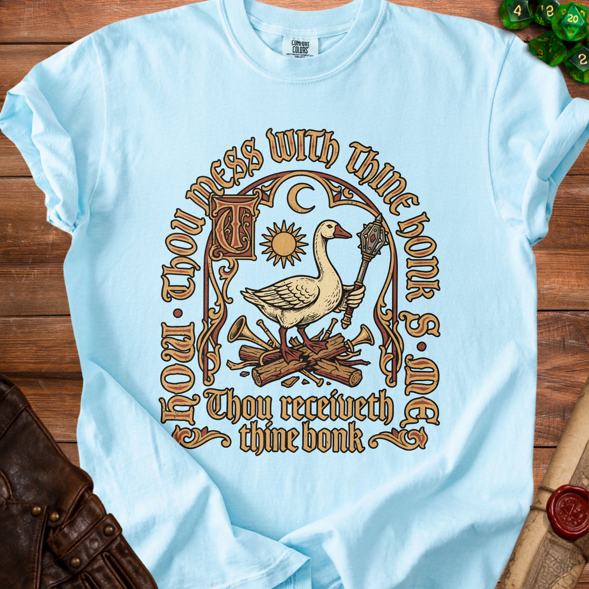 Light blue t-shirt with a goose holding a mace and the text "Thou mess with thine honk S·ME Thou receiveth thine bonk."