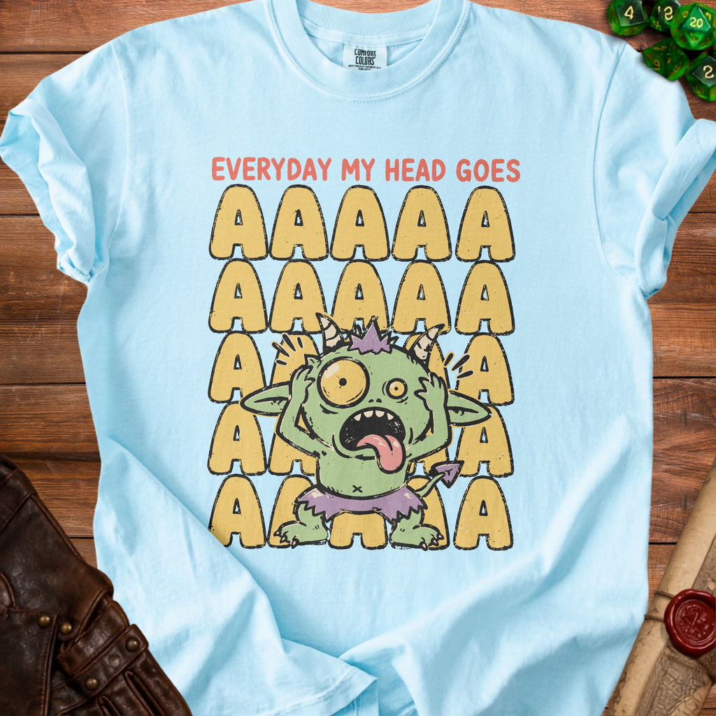 Light blue t-shirt with a distressed graphic of a green monster and "EVERYDAY MY HEAD GOES AAAAA".