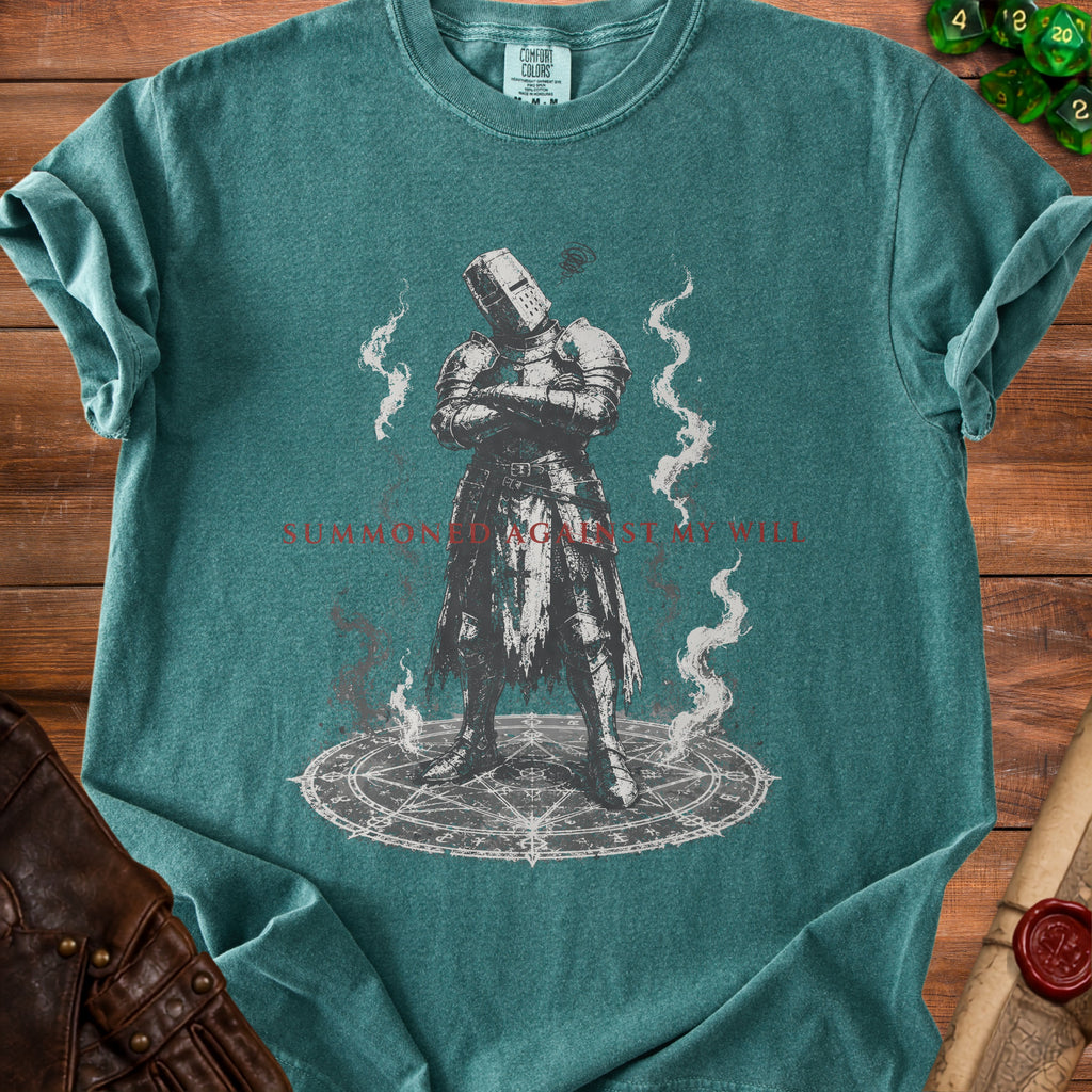 T-shirt graphic of knight on pentagram with text "SUMMONED AGAINST MY WILL".
