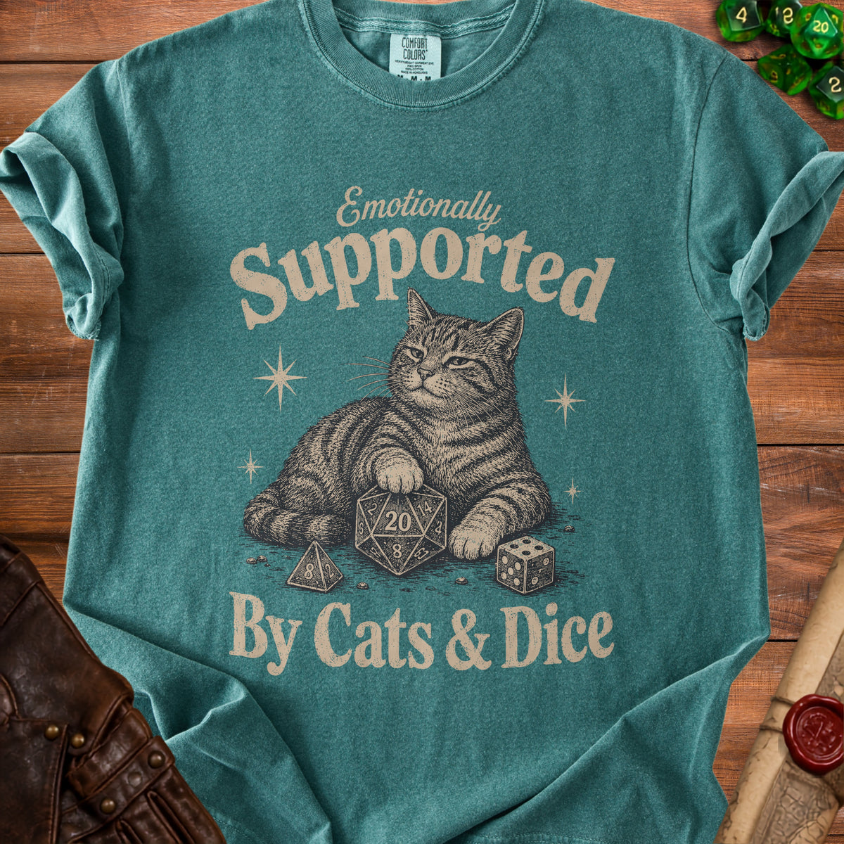 T-shirt with cat graphic and text "Emotionally Supported By Cats & Dice".