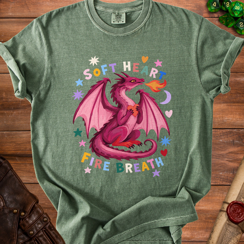 Green t-shirt with pink dragon breathing fire, holding a heart, with text.