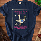 Navy t-shirt with a goose graphic and text: "THOU MESS WITH THINE HONK THOU RECEIVETH THINE BONK".