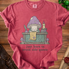 Red Comfort Colors t-shirt with mushroom character reading a scroll; "just here to avoid side quests".