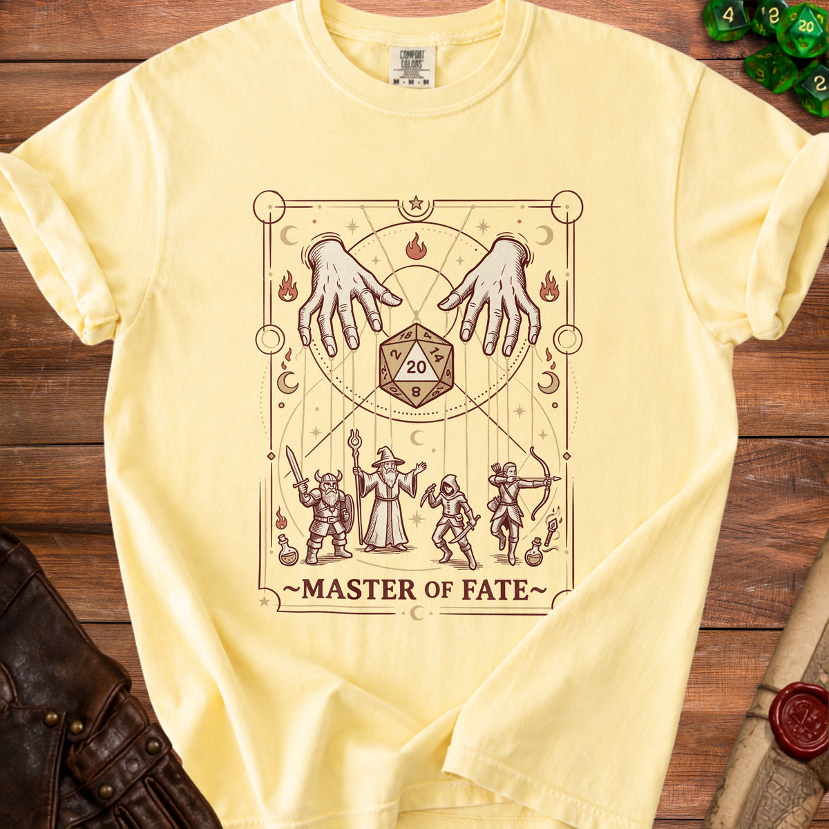 T-shirt graphic with hands, d20 die, wizard, warrior, rogue, and archer below text "Master of Fate".