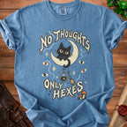 Blue t-shirt with a black cat on a crescent moon and "No thoughts only hexes" text.