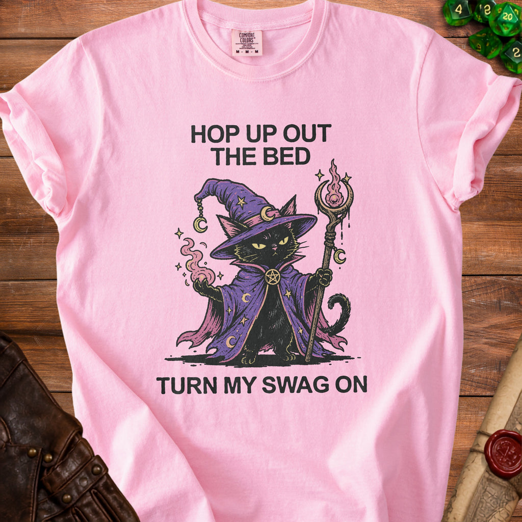 Pink t-shirt with graphic of black cat wizard and text "Hop up out the bed turn my swag on".