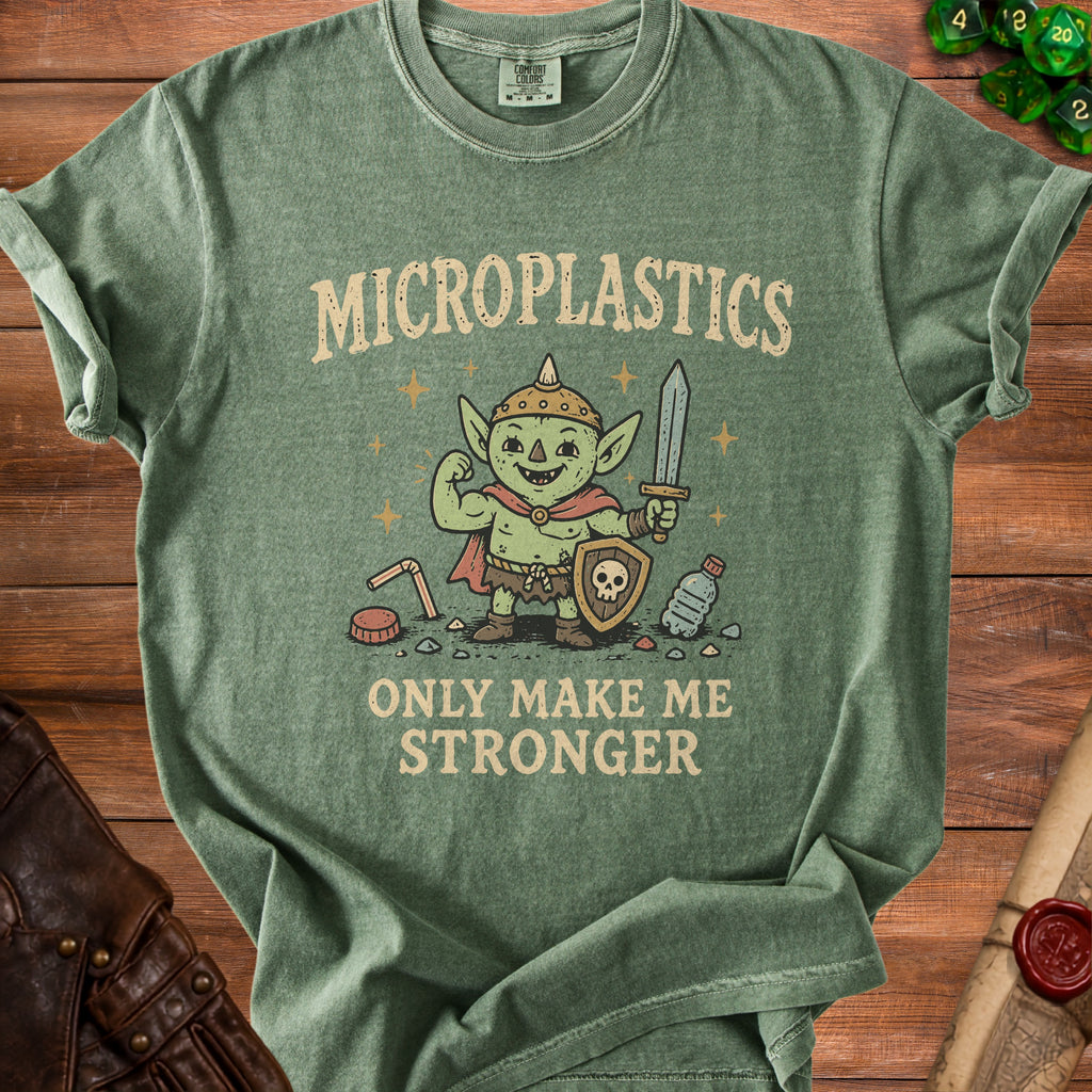 Green t-shirt with a goblin holding a sword and shield, reading "Microplastics Only Make Me Stronger."