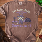 Brown t-shirt with graphic: "My Aura Farm was shut down by the Government"