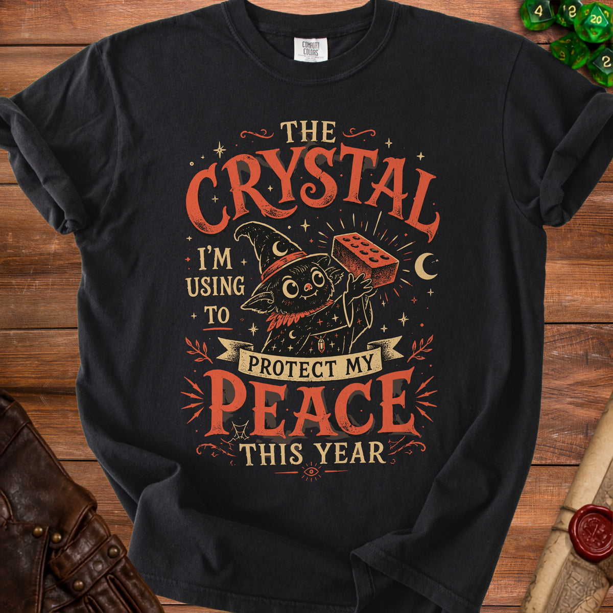 Black t-shirt with "The Crystal I'm Using to Protect My Peace This Year" text.