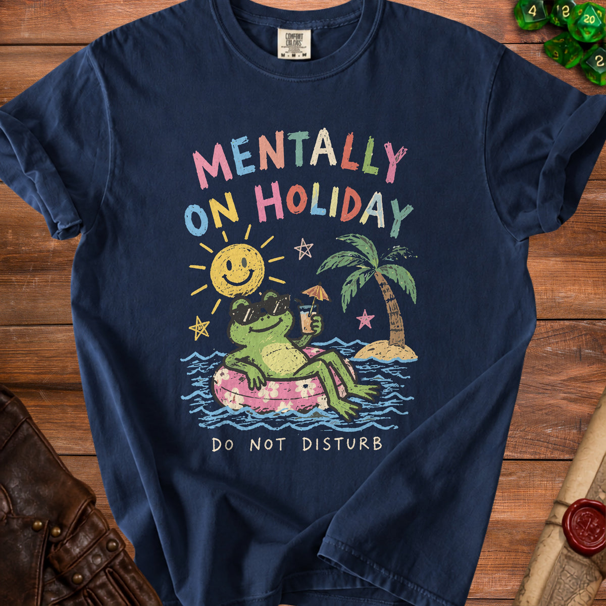 Navy t-shirt with a graphic of a frog on an inner tube, "Mentally on Holiday" and "Do Not Disturb".