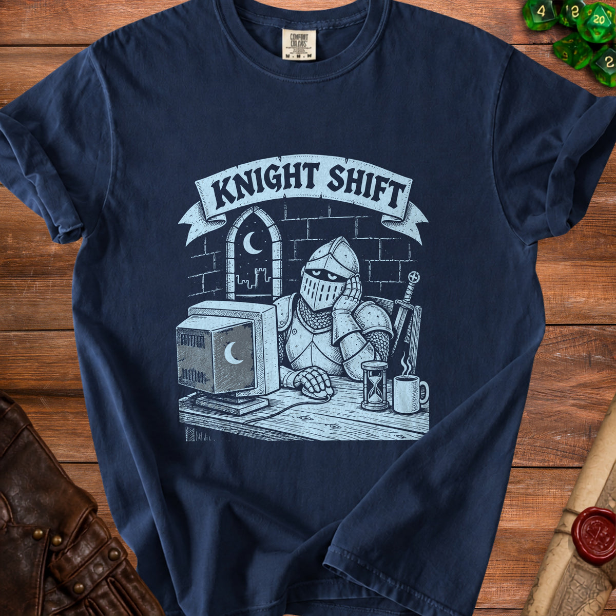 T-shirt graphic of knight at computer with text "KNIGHT SHIFT."