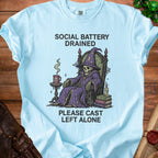 Skeleton wizard sitting in a throne with "Social Battery Drained" and "Please Cast Left Alone" text.