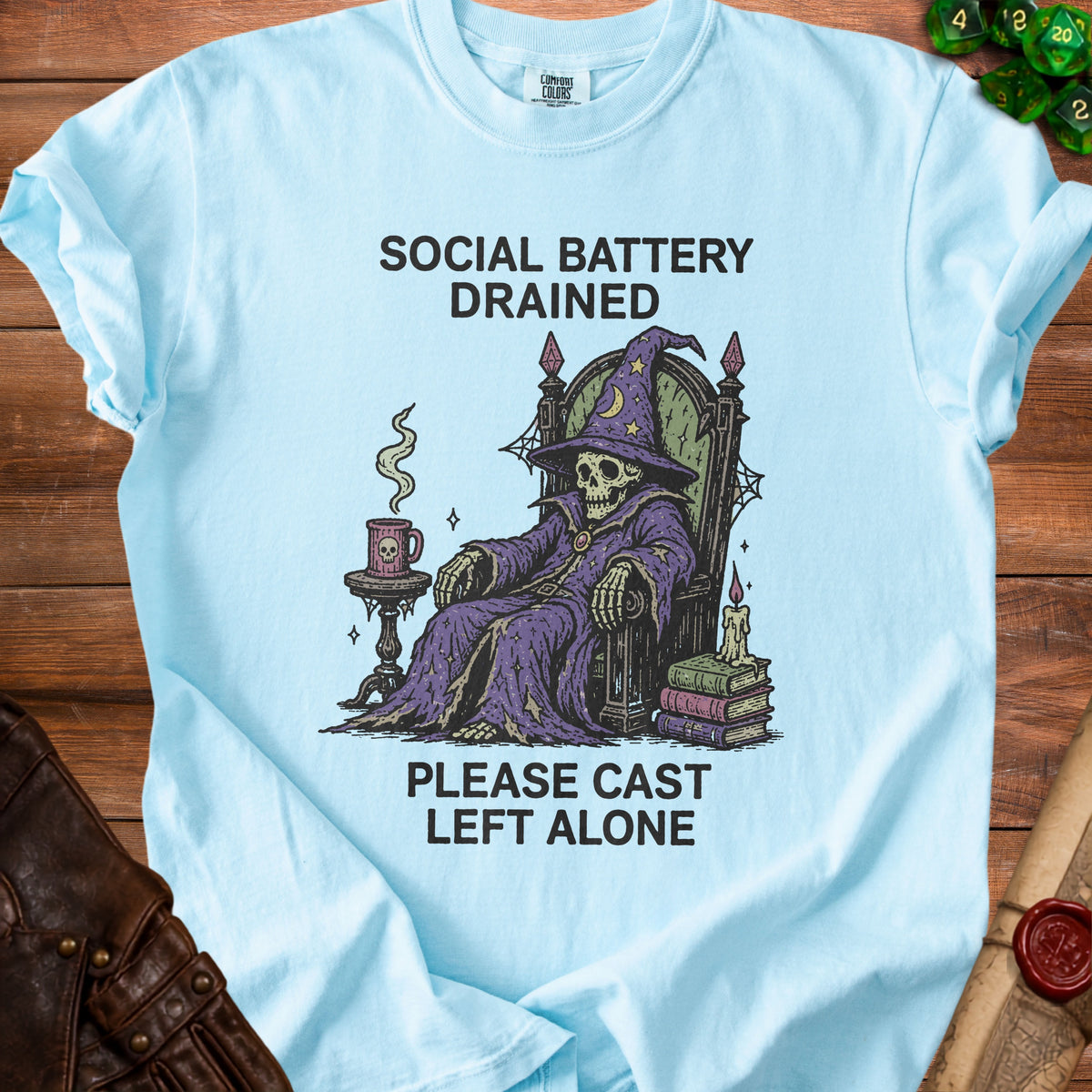 Skeleton wizard sitting in a throne with "Social Battery Drained" and "Please Cast Left Alone" text.