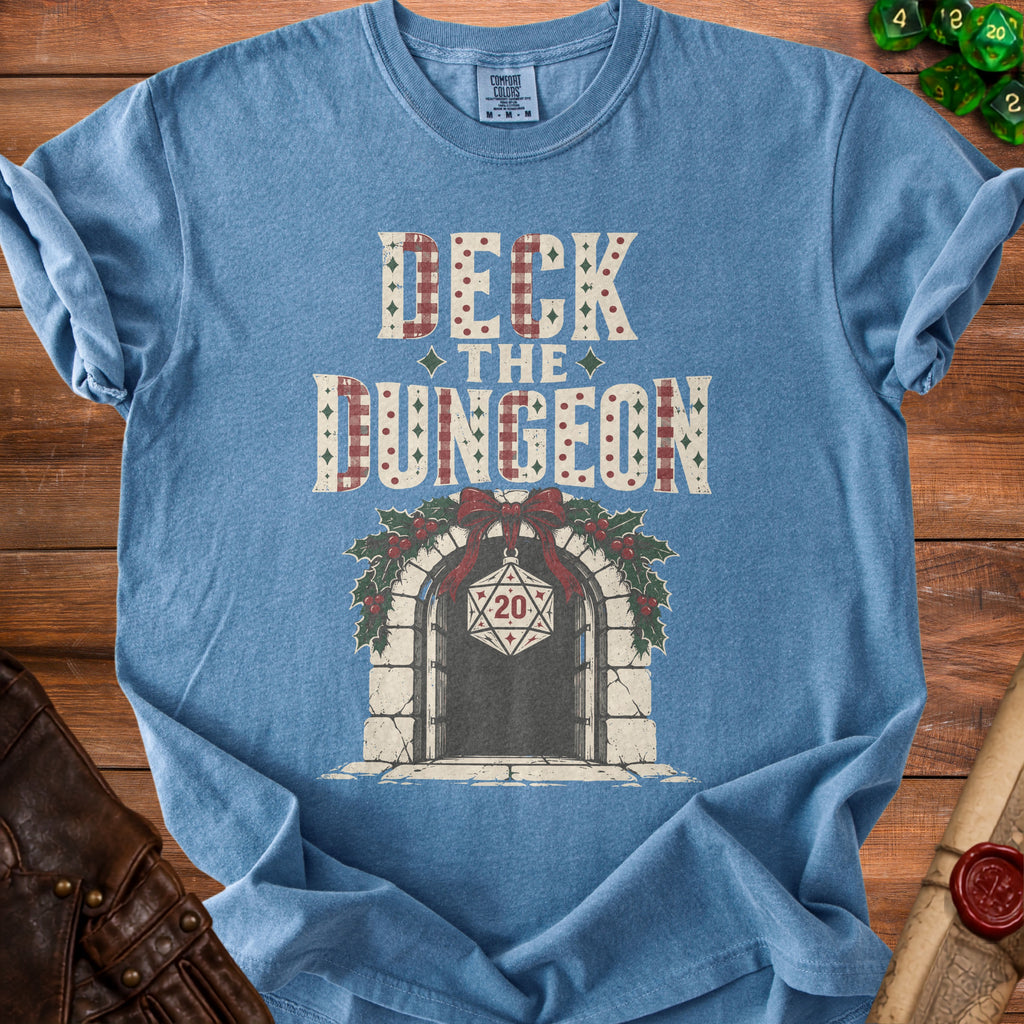 Blue t-shirt with "Deck the Dungeon" text and a D20 dice ornament.
