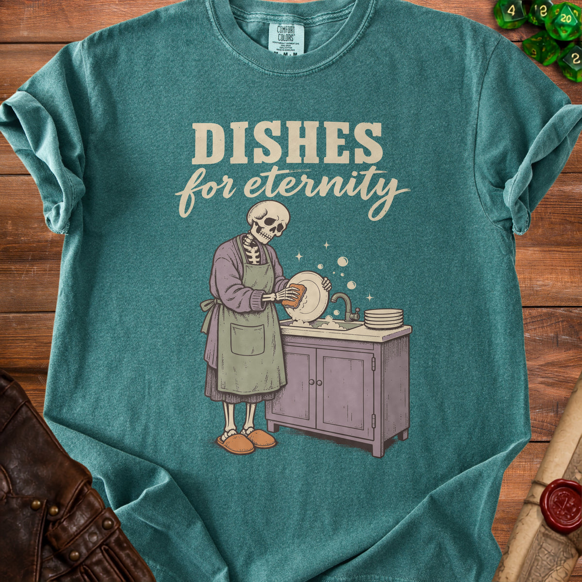 Skeleton washing dishes with text "DISHES for eternity" on t-shirt.