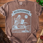 Brown t-shirt with "NECROMANAGER" text and a skeleton at a desk.