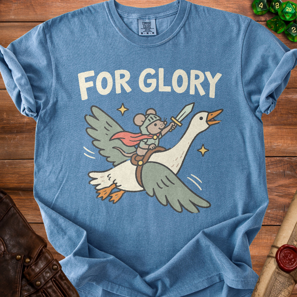 Blue t-shirt featuring an illustration of a mouse in armor riding a flying goose with the text FOR GLORY.