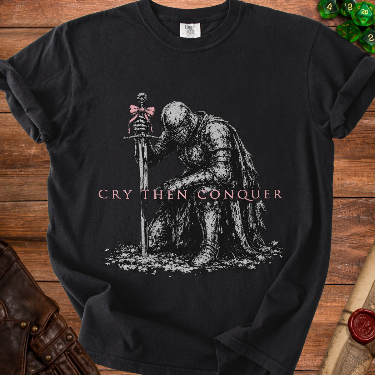 Black t-shirt with a knight holding a sword and the text "CRY THEN CONQUER".