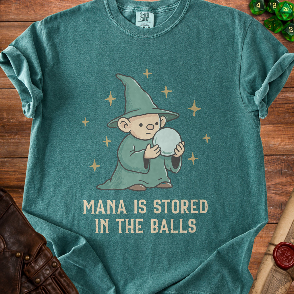 Teal t-shirt with a cartoon wizard holding a crystal ball and text "MANA IS STORED IN THE BALLS."