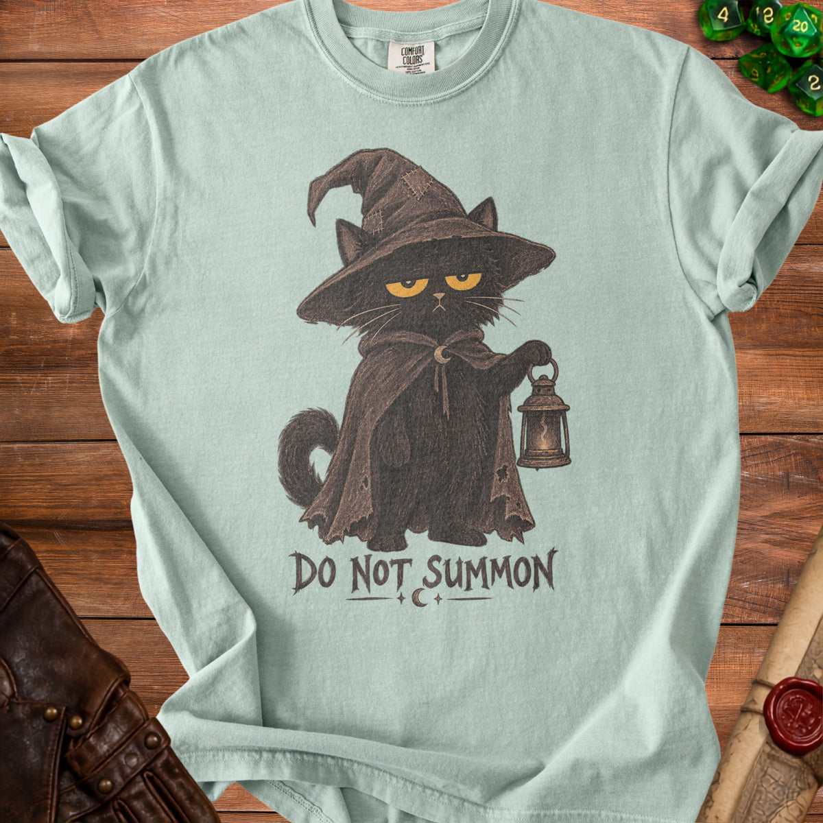 Black cat in witch hat and cloak holds lantern with text "DO NOT SUMMON".