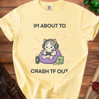 Yellow t-shirt with a cat wearing headphones playing video games.