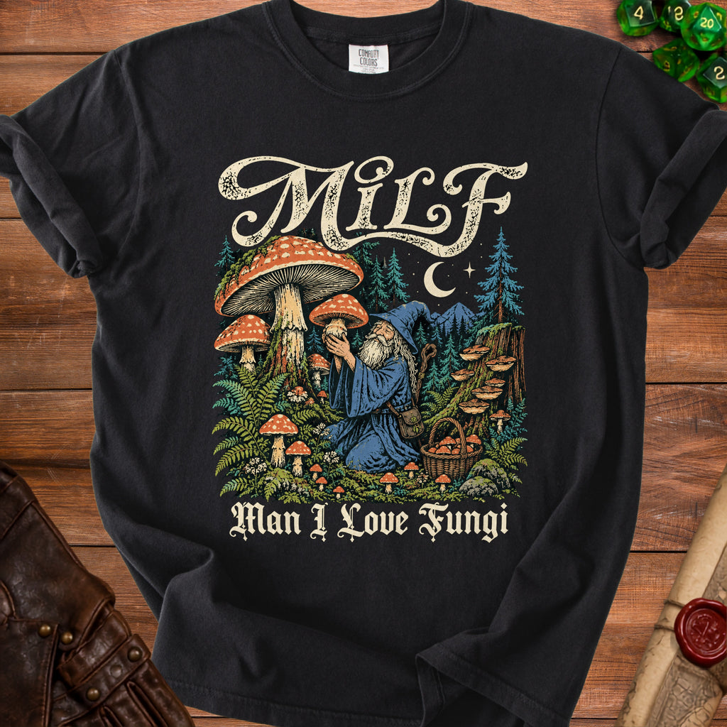 Black t-shirt with a wizard among mushrooms and the text "MILF Man I Love Fungi."